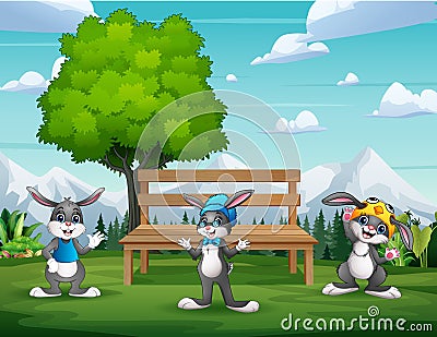 Cute three bunnies cartoon in the park landscape Vector Illustration