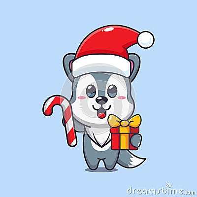 Cute wolf holding christmas candy and gift. Cute christmas cartoon character illustration. Vector Illustration