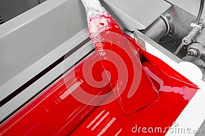 Print shop red magenda color ink roller Stock Photo