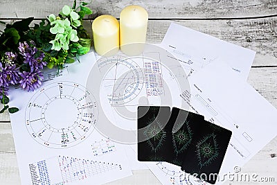 Printed astrology charts and tarot cards, work place for astrologer, life mapping, blueprint of life, forecasting for future, with Stock Photo