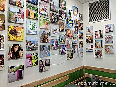 Printed Instagram Photos on wall of Jamba Juice Editorial Stock Photo