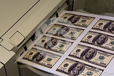 Printer printing fake dollar bills isolated on white Stock Photo