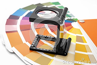 Printing loupe used to examine colour chart concept for color check, analyze quality of output colours of printing and magnifying Stock Photo