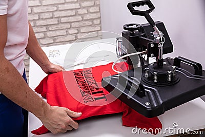 Printing on t shirt in workshop Stock Photo