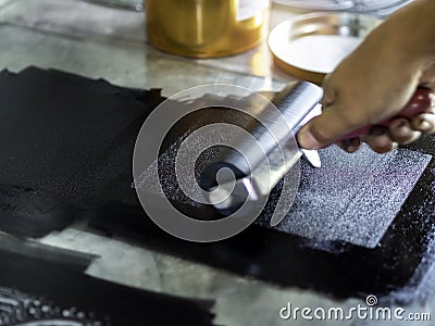 Printmaking tool in art studio. Stock Photo