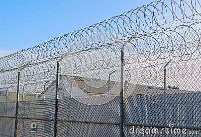 Prison fence line Editorial Stock Photo