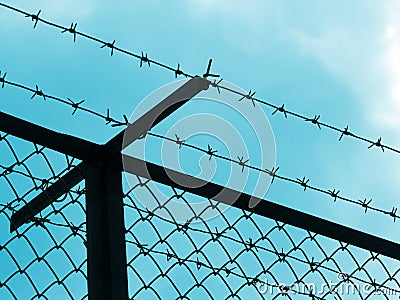 Prison fence silhouette Stock Photo