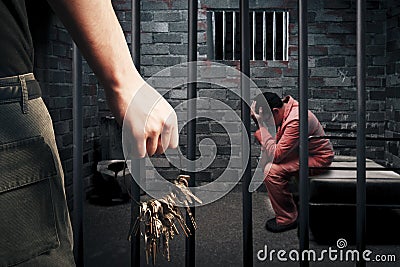 Prison guard with keys Stock Photo