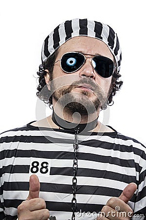 Prison, one caucasian man prisoner criminal with chain ball and Stock Photo