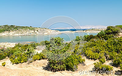 The pristine coastline and crystal clear water of the island of Stock Photo