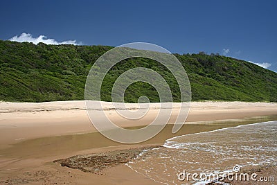 Pristine deserted beach Stock Photo