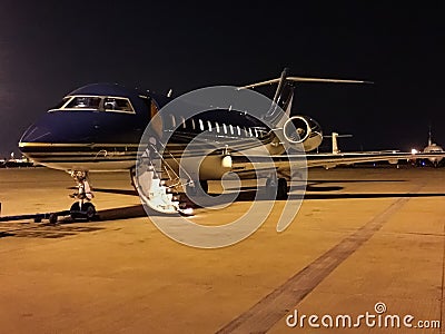 Private Global Express ready for boarding at night Editorial Stock Photo