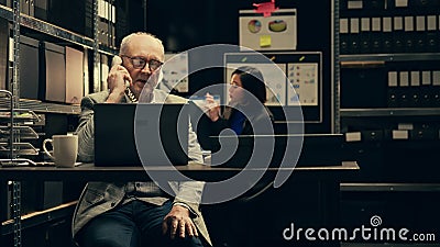 Private investigator requesting crucial information on landline phone call Stock Photo