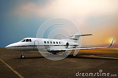 Private jet airplane parking at the airport. Stock Photo