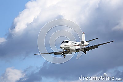 Private jet on approach to land Stock Photo