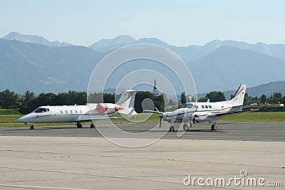 Private Jet and Turbo Prop Stock Photo