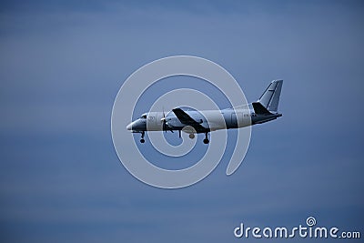 Private plane in the sky, landing Editorial Stock Photo