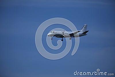 Private plane in the sky, landing Editorial Stock Photo