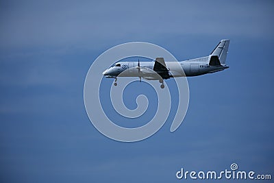 Private plane in the sky, landing Editorial Stock Photo