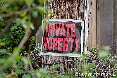 Private property sign on post Stock Photo