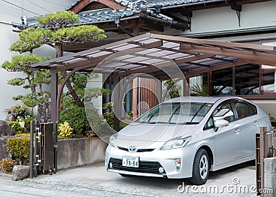 Private Toyota Prius parked near the house Editorial Stock Photo