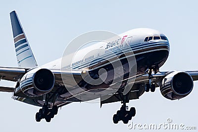 Privilege Style Boeing 777-200 passenger plane at airport. Aviation and aircraft. Air transport and travel. Fly and Editorial Stock Photo