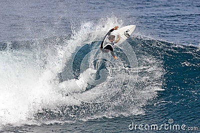 Pro Surfer Kalani Chapman surfing in Hawaii Editorial Stock Photo