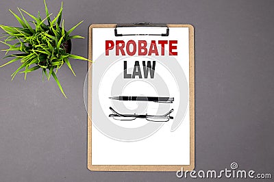 PROBATE LAW on the brown clipboard on the grey background. Business concept Stock Photo