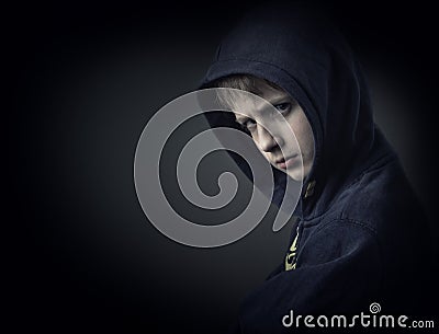 Problem child on black background Stock Photo