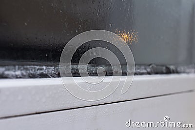 The problem of freezing of plastic Windows in the winter time, the front and background blurred with the bokeh effect Stock Photo
