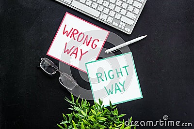 Problem solving. Right and wrong way icons on work desk from above Editorial Stock Photo