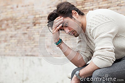 Problems and stress, stressed beautiful young man Stock Photo