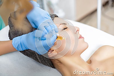 Procedure Plasmolifting injection. plasma injection into the skin of cheeks of the patient Stock Photo