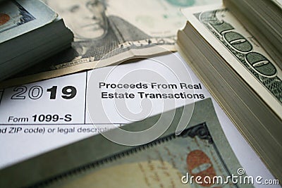 Proceeds From Real Estate Transaction Form With Money High Quality Stock Photo