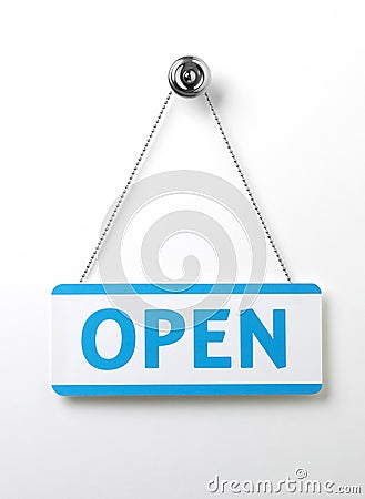 Process blue open door sign on a silver chain on a Stock Photo