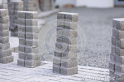 Process of building new path made from concrete blocks, interlocking pave Stock Photo