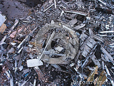 A process of buliding destruction, demolished house, shot from air with drone Stock Photo