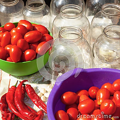 Process cooking brinefor pickled tomatoes and and chili peppers Stock Photo