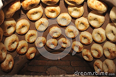 Process of cooking tandoor bread national Uzbek flatbread Stock Photo