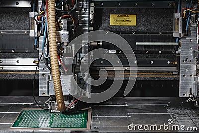 Process of creating a printed circuit board. Automated technology, industrial, robotic, electronic, production Stock Photo