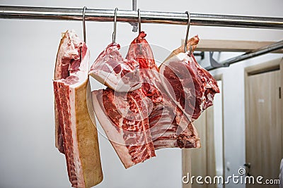 The process of cutting and chopping meat. Stock Photo