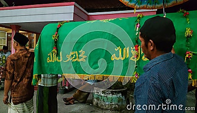 the process of departing the Islamic body to the grave Editorial Stock Photo