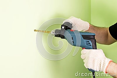 The process of drilling using electric drills Stock Photo