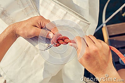 Process of knitting Bowline Stock Photo