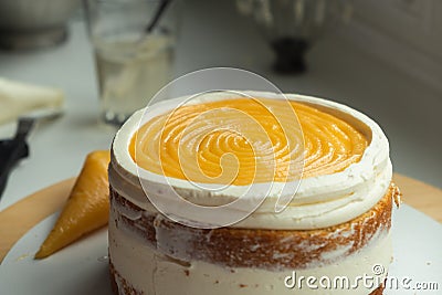 Process of layered cake assembling. Stock Photo