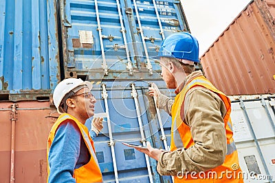Process of loading ship with container storage units Stock Photo