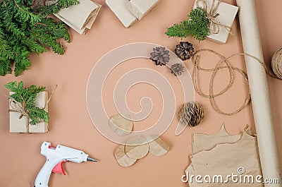 process of making Christmas tree decorations from craftpaper. Concept budget savings Stock Photo