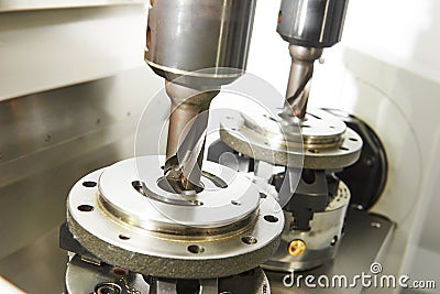 Process of metal machining by twin mill Stock Photo