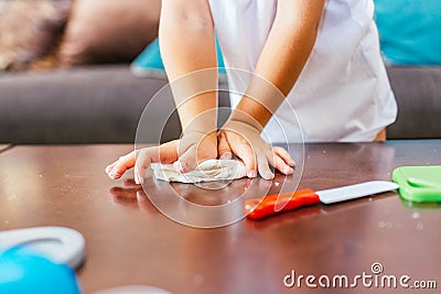 The process of play dough modeling, the child`s hands sculpt figures. Play dough in preschool or nursery for education concept Stock Photo