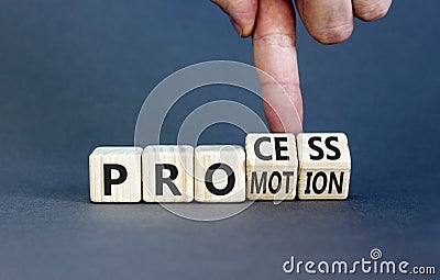 Process and promotion symbol. Concept words Process and promotion on wooden cubes. Businessman hand. Beautiful grey table grey Stock Photo